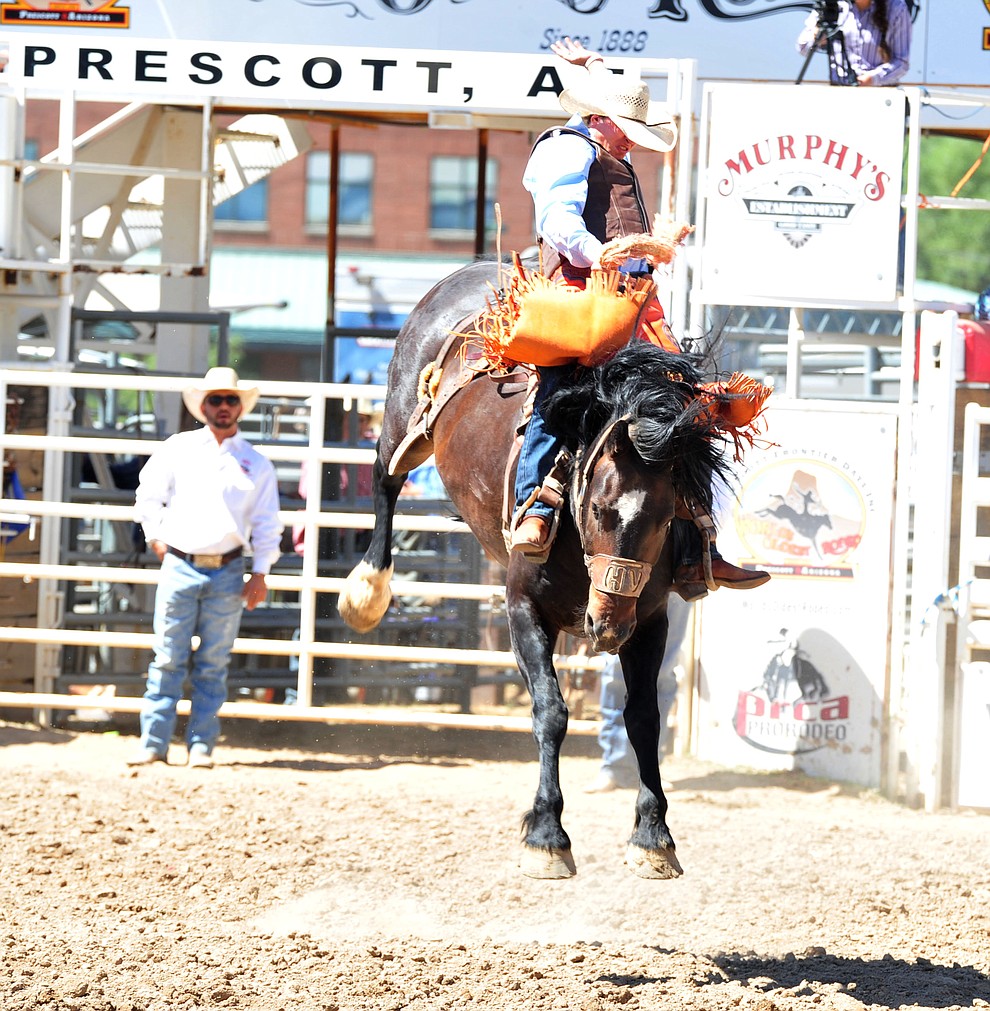 Parker Kempfer on Happy Valley in the saddle bronc riding during the third performance of the Prescott Frontier Days Rodeo Saturday, June 30, 2018.(Les Stukenberg/Courier)