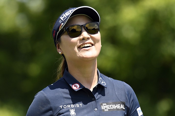 So Yeon Ryu smiles as she walks on the fairway of the second hole during the third round of the KPMG Women’s PGA Championship golf tournament at Kemper Lakes Golf Club in Kildeer, Ill., Saturday, June 30, 2018. (David Banks/AP Photo)