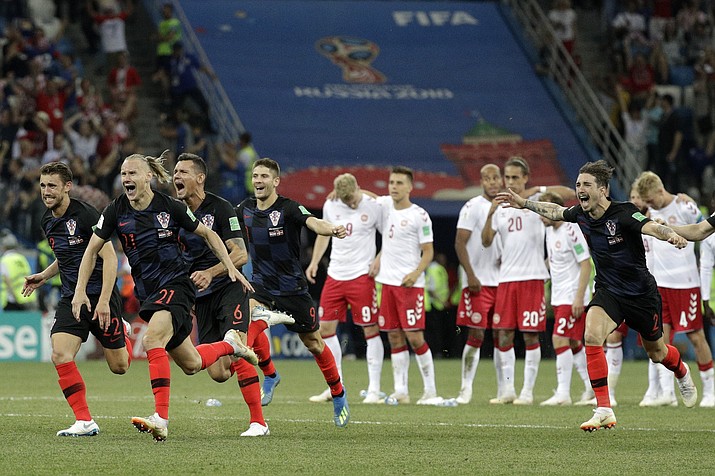 Croatians players celebrate after the penalties during the round of 16 match between Croatia and Denmark at the 2018 soccer World Cup in the Nizhny Novgorod Stadium, in Nizhny Novgorod, Russia, Sunday, July 1, 2018. Croatia eliminates Denmark 3-2 on penalties after game ends 1-1. (Gregorio Borgia/AP Photo)