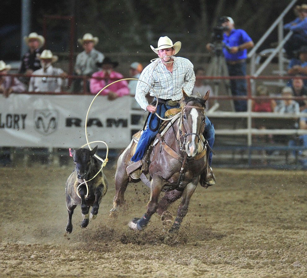 Pryce Harris runs 13.1 in the tie down roping during the 6th performance of the Prescott Frontier Days Rodeo Monday, July 2, 2018. (Les Stukenberg/Courier)