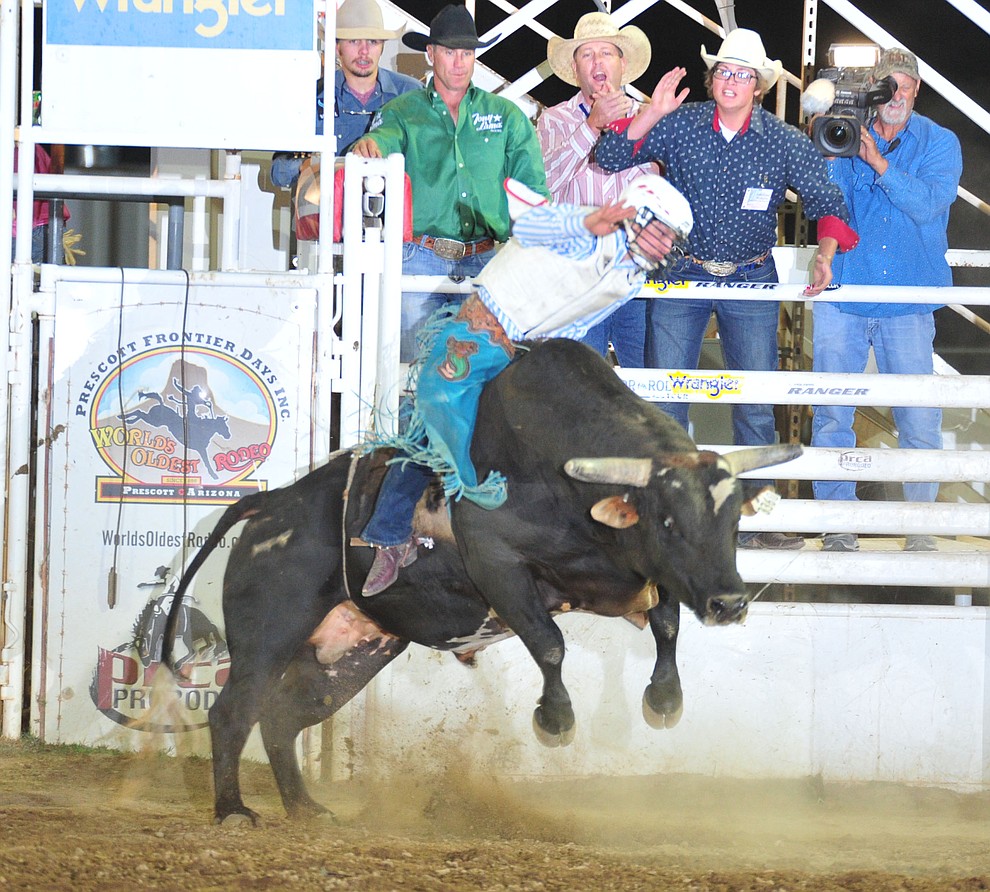 Wille Dynes on Pistol Packin Mama in the bull riding during the 6th performance of the Prescott Frontier Days Rodeo Monday, July 2, 2018. (Les Stukenberg/Courier)