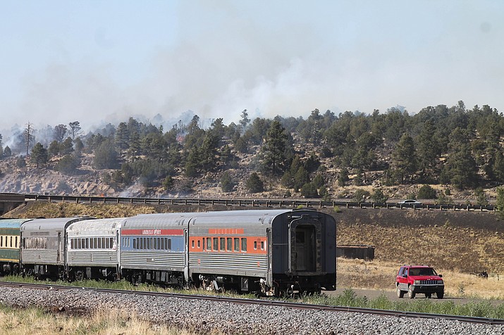 A wildfire burns north of I-40 near Williams July 3. Because of the potential for fire spread, firefighters have evacuated Kaibab Lake campground. Campers have been relocated to Williams Rodeo Grounds.