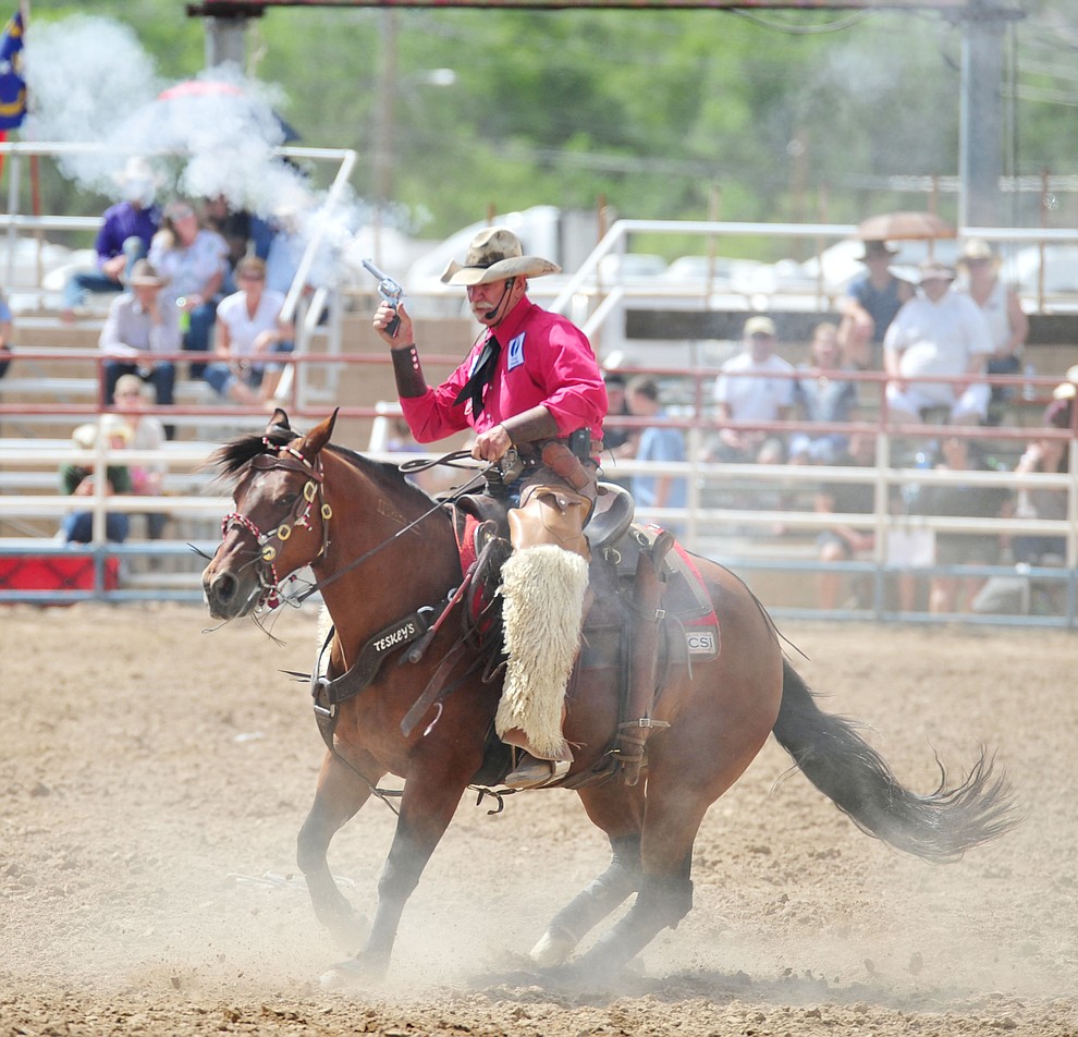 Bobby Kerr performs on Pancho, an American Mustang, during the final performance of the 2018 Prescott Frontier Days Rodeo Wednesday, July 4, 2018. (Les Stukenberg/Courier)