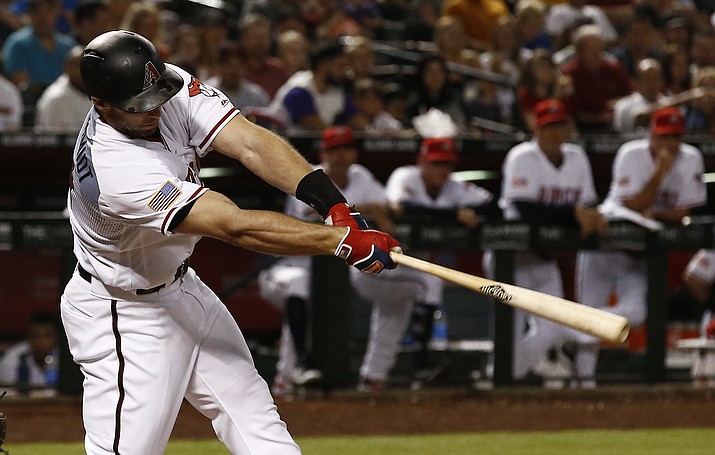 Arizona Diamondbacks' Paul Goldschmidt swings on a three-run home run against the St. Louis Cardinals during the fifth inning of a baseball game Tuesday, July 3, 2018, in Phoenix. (Ross D. Franklin/AP)