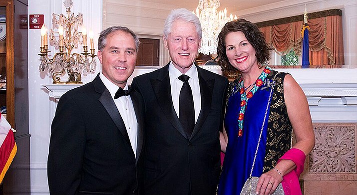 From left, Bill Carter, former US President Bill Clinton, Verde Valley School anthropology teacher Leigh Carter. Bill Carter’s most recent work is with GO-Labs from MIT, and officials in Puerto Rico, to help redesign PR’s electrical grid destroyed in Hurricane Maria. Courtesy photo
