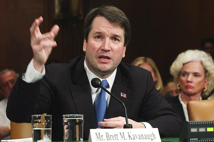 In this April 26, 2004, file photo, Brett Kavanaugh appears before the Senate Judiciary Committee on Capitol Hill in Washington. Kavanaugh is on President Donald Trump's list of potential Supreme Court Justice candidates to fill the spot vacated by retiring Justice Anthony Kennedy. (AP Photo/Dennis Cook, File)

