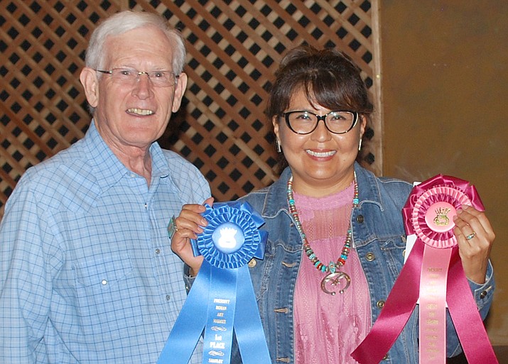 Diné Navajo Veronica Benally poses with Sharlot Hall Museum Executive Director Fred Veil. Benally won Best of Show honors and earned a blue ribbon for jewelry at the 21st annual Prescott Indian Art Market at Sharlot Hall Museum. The show continues today. (Courtesy)