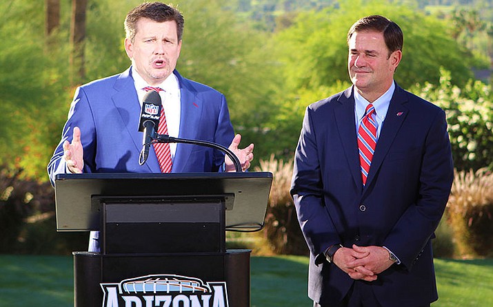 The Cardinals are receiving criticism for promoting the support president Michael Bidwill (left) has for Super Court nominee Brett Kavanaugh. In the past, he has also supported then-gubernatorial candidate Doug Ducey (right). (Photo by Jack Harris/Cronkite News)