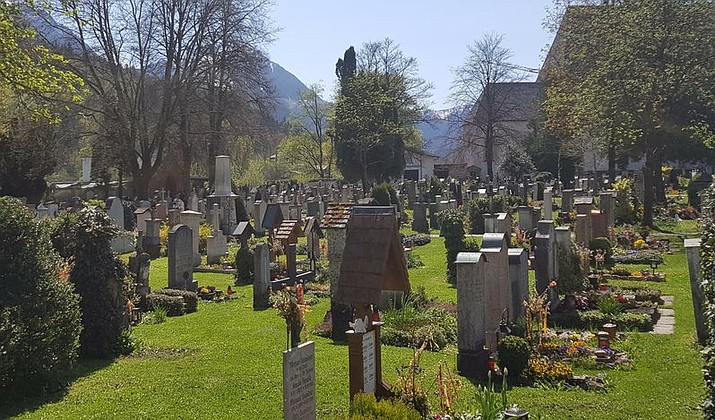 The May 16, 2018 file photo shows graves on the graveyard in Berchtesgaden, southern Germany. The the picturesque town in the Bavarian Alps is now taking the unusual step of holding a lottery for vacant spaces in its cemetery due to lack of space. (Kilian Pfeiffer/dpa via AP)

