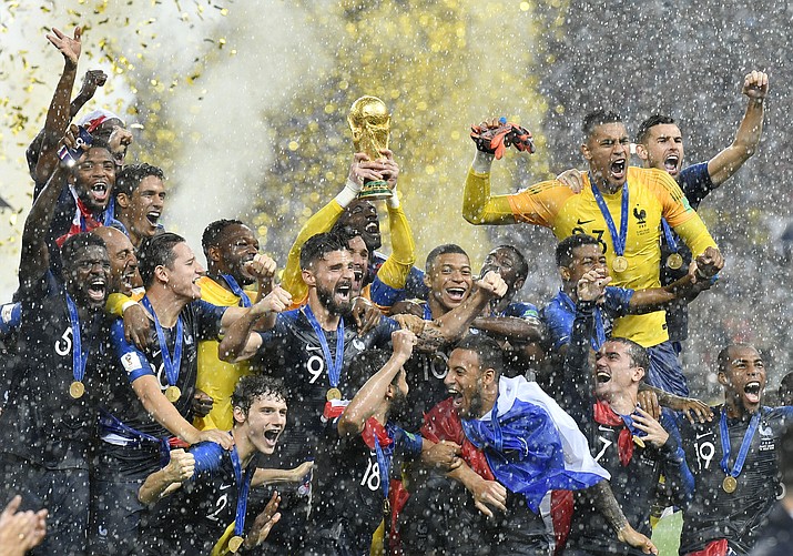 France goalkeeper Hugo Lloris lifts the trophy after France won 4-2 during the final match between France and Croatia at the 2018 soccer World Cup in the Luzhniki Stadium in Moscow, Russia, Sunday, July 15, 2018. (Martin Meissner/AP Photo)