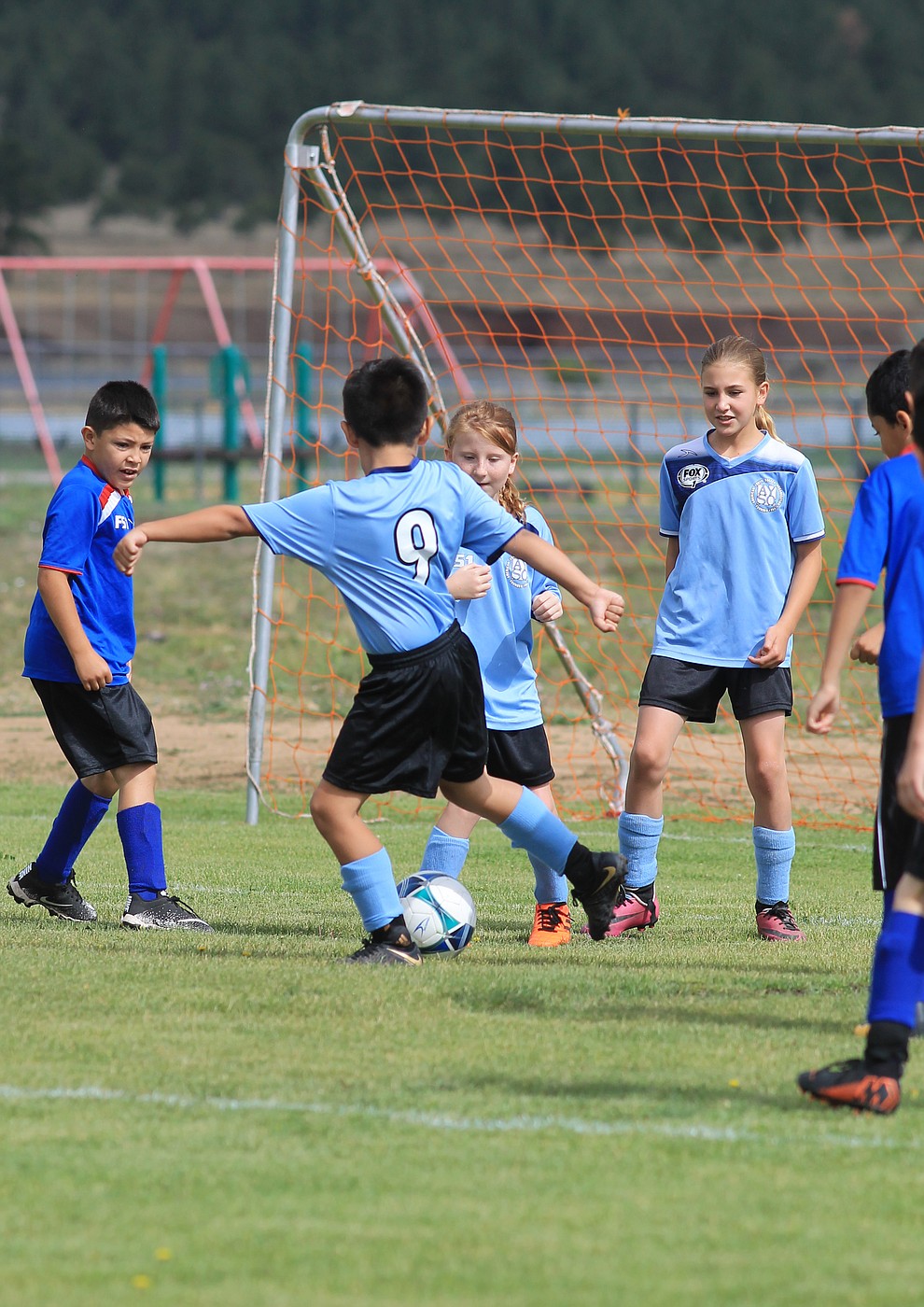 Williams AYSO players wdefend the goal in a game against Flagstaff July 14 at the WEMS field.