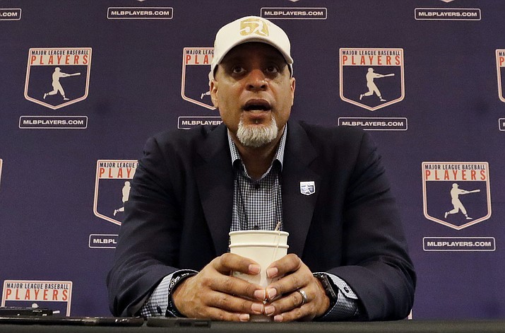 In this Feb. 19, 2017, file photo, Tony Clark, executive director of the Major League Players Association, answers questions at a news conference in Phoenix. Baseball commissioner Rob Manfred is defending teams’ reluctance to sign free agents last offseason and says union head Tony Clark has not responded to a pair of invitations to have a broad discussion about players’ concerns and changes in the way the game is played, Tuesday, July 17, 2018. (Morry Gash/AP, File)