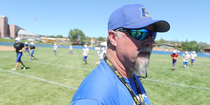 Prescott football head coach Michael Gilpin watches his players warm up during practice Aug. 17, 2017, in Prescott. Gilpin and the Badger football team are currently in Show Low for training camp. Prescott kicks off the 2018 season Friday, Aug. 17, with a home game against Desert Edge. (Les Stukenberg/Courier, File)
