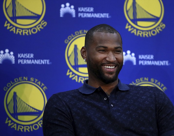 Golden State Warriors' DeMarcus Cousins smiles during a media conference Thursday, July 19, 2018, in Oakland, Calif. Cousins signed a one-year, $5.3M deal with the defending champion Warriors. (Ben Margot/AP)