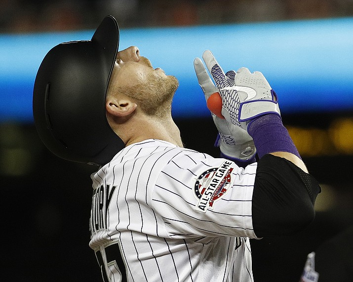 Colorado Rockies shortstop Trevor Story points skyward after his seventh inning solo home run during the Major League Baseball All-star Game, Tuesday, July 17, 2018 in Washington. (Patrick Semansky/AP)