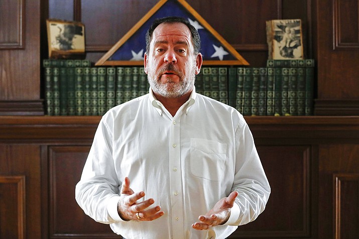 In this Feb. 3, 2018, file photo, Ross Geiger speaks as he poses for a photograph at his home in the Cincinnati suburb of Loveland, Ohio. Ohio Gov. John Kasich spared death row inmate Raymond Tibbetts on Friday, July 20, 2018, commuting the condemned killer's death sentence to life without the possibility of parole. Geiger, a juror who recommended the death sentence after Tibbetts was convicted of fatally stabbing Fred Hicks in 1997 in Cincinnati, came forward in 2017 to say he felt jurors weren't given enough information about the convicted killer's tough childhood. (AP Photo/John Minchillo, File)

