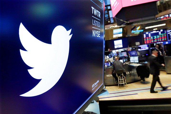 The logo for Twitter is displayed above a trading post on the floor of the New York Stock Exchange. Calls to ban Donald Trump from Twitter are as old as his presidency. But it’s not going to happen, at least not while he’s president. Twitter’s view is that keeping up political figures’ controversial tweets encourages discussion and helps hold leaders accountable. (AP Photo/Richard Drew, File)

