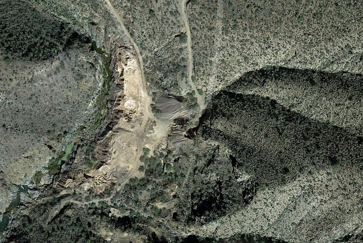 Arizona prosecutors say Bagdad Hillside, LLC, discharged contaminated water from its Hillside Mine — located four miles north of Bagdad — into Boulder Creek at a rate of about 2.6 million gallons a year after signing consent orders to stop the practice. (Google Earth)