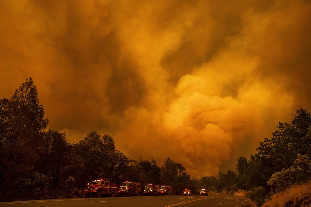 The Carr Fire burns along Highway 299 in Shasta, Calif., on Thursday, July 26, 2018. (AP Photo/Noah Berger)