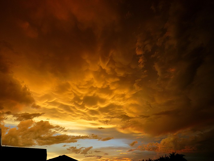 Mammatus clouds gilded by the setting sun. Melissa Bowersock 