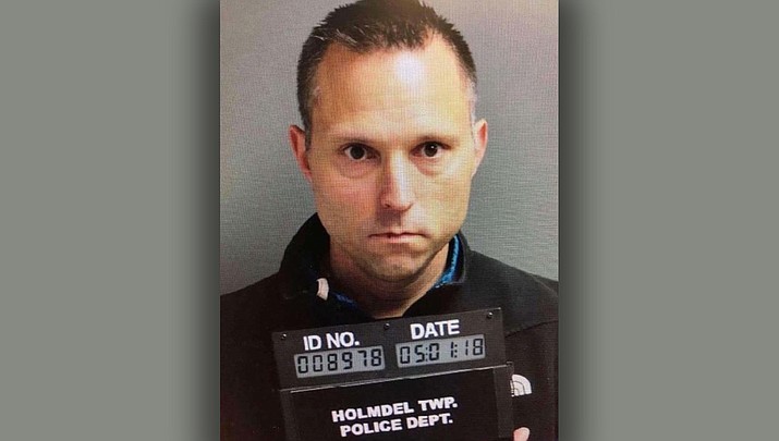 Thomas Tramaglini, former superintendent for the Kenilworth School District. says he will file a lawsuit over this police mug shot. (Holmdel Police Department)