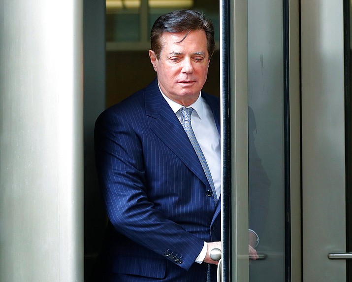 In this Feb. 14, 2018, file photo, Paul Manafort leaves the federal courthouse in Washington. The trial of President Donald Trump’s former campaign chairman will open this week with tales of lavish spending on properties and clothing and allegations that the political consultant laundered money through offshore bank accounts. What’s likely to be missing: answers about whether the Trump campaign colluded with Russia during the 2016 presidential election. (AP Photo/Pablo Martinez Monsivais, File)

