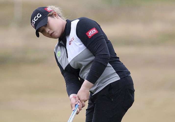 In this Sunday, July 29, 2018 photo, Thailand’s Ariya Jutanugarn putts on the 16th green during day four of the 2018 Women’s Scottish Open at Gullane Golf Club, in East Lothian, Scotland. Jutanugarn is coming round reluctantly to the quirky nature of links golf and that makes the world’s No. 1 player an even more dangerous prospect heading into the Women’s British Open this week.  (Jane Barlow/PA via AP)