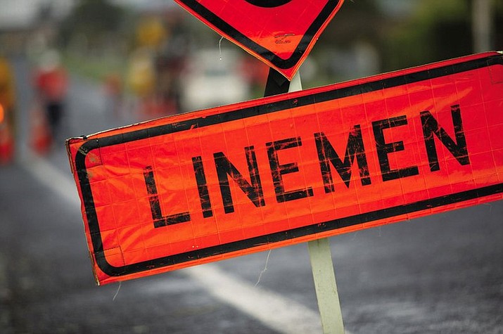 This May 2015, photo supplied from Vector, shows a sign for staff working on power lines in Auckland, New Zealand. Seven-year-old Zoe Carew knew it wasn’t right when she saw people working on power lines near the road and a warning sign that read “LINEMEN.” Carew wrote a letter to the New Zealand Transport Agency after she had talked about the sign with her dad and wondered why it said “men” when women can also work on the power lines. (Vector/New Zealand Herald via AP)

