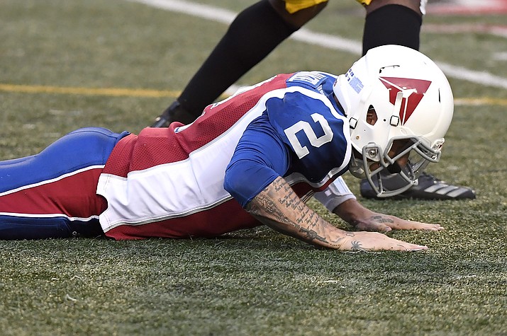 Montreal Alouettes quarterback Johnny Manziel reacts after throwing an interception against the Hamilton Tiger-Cats during the first half of a Canadian Football League game Friday, Aug. 3, 2018, in Montreal. (Paul Chiasson/The Canadian Press, via AP)