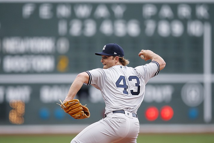 New York Yankees' Chance Adams pitches during the first inning of a baseball game against the Boston Red Sox in Boston, Saturday, Aug. 4, 2018. (Michael Dwyer/AP)