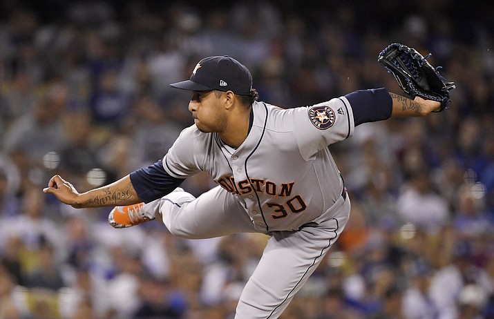 Houston Astros relief pitcher Hector Rondon throws during the ninth inning of the team’s baseball game against the Los Angeles Dodgers on Friday, Aug. 3, 2018, in Los Angeles. (Mark J. Terrill/AP Photo)