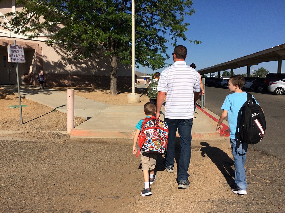 Walking up to school on the first day of school Monday, Aug. 6, at Mountain View Elementary School in Prescott Valley. (Sue Tone/Courier)