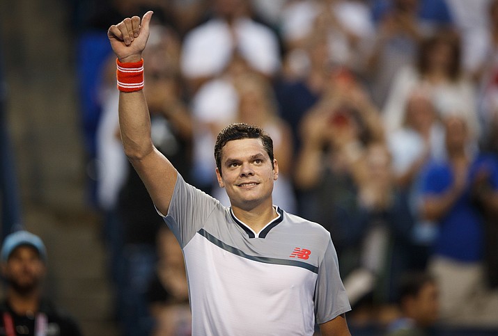 Canada’s Milos Raonic celebrates defeating David Goffin of Belgium during the first round of the Men’s Rogers Cup tennis tournament in Toronto, Monday Aug. 6, 2018. (Mark Blinch/The Canadian Press via AP)