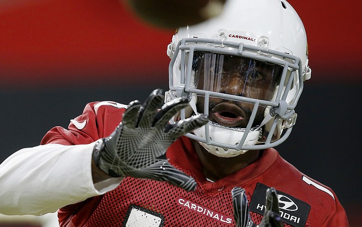 Arizona Cardinals wide receiver Greg Little reaches out to catch a pass during NFL football practice Thursday, Aug. 9, 2018, in Glendale. (Ross D. Franklin/AP)