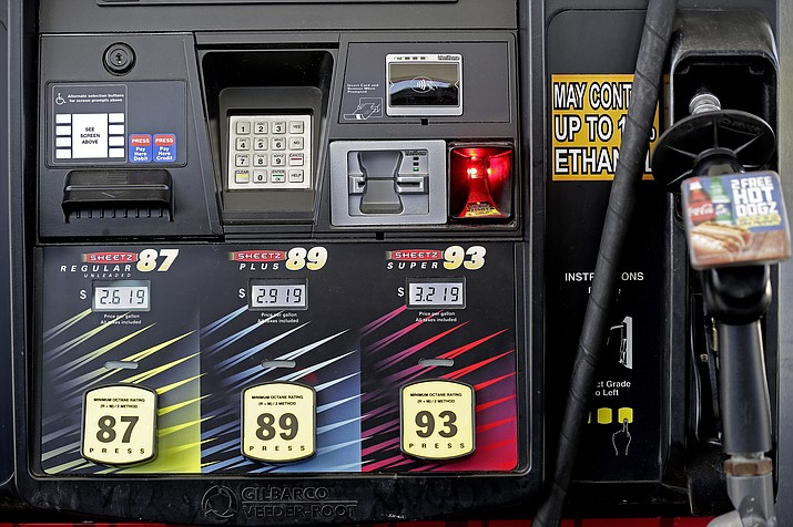 In this June 14, 2018, file photo, gasoline prices are displayed on a pump. On Friday, Aug. 10, the Labor Department reported on U.S. consumer prices for July - showing a 2.9 percent increase. (Gerry Broome/AP, File)