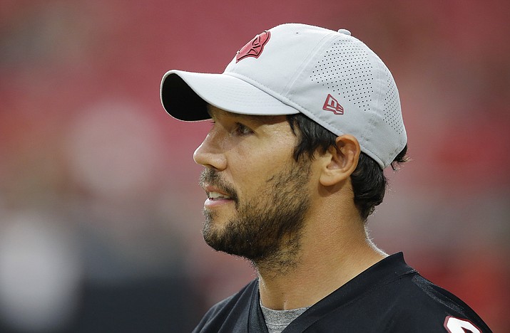 Arizona Cardinals quarterback Sam Bradford watches teammates from the sidelines during an NFL football practice Monday, Aug. 13, 2018, in Glendale. (Ross D. Franklin/AP)