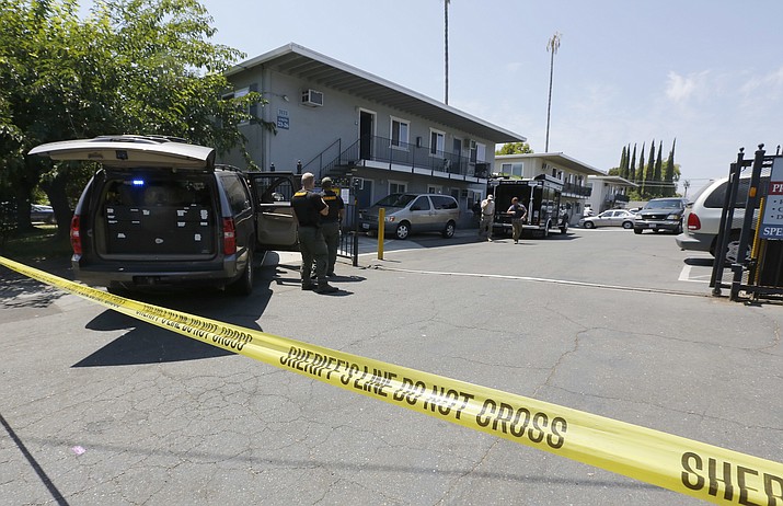 Crime scene tape blocks the entrance to an apartment complex following the arrest of a 45-year-old Iraqi refugee, Omar Ameen, Wednesday, Aug. 15, 2018, in Sacramento, Calif. Ameen was arrested on a warrant alleging that he killed an Iraqi policeman in 2014 while serving with the Islamic State terror organization. (Rich Pedroncelli/AP)