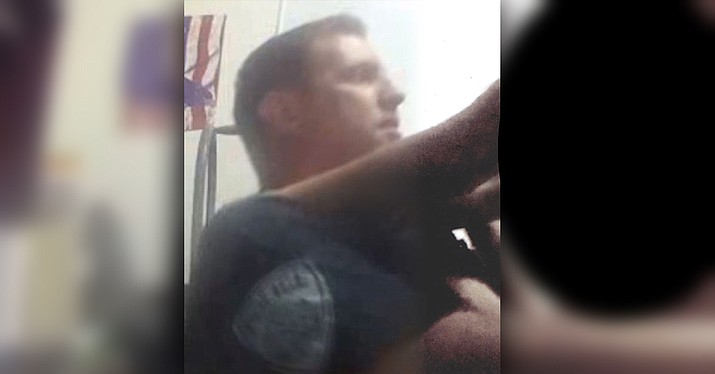 A screenshot from body cam video shows former Superior Police Commander Anthony Doran having sex in his office.  A lawsuit against four Arizona policemen has brought the body cam video to light. (Image from video/Pinal County Sheriff's Office)