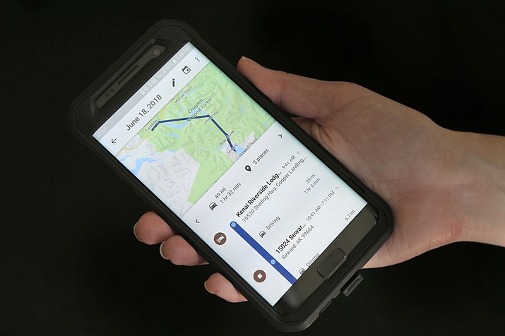In this Aug. 8, 2018, file photo a mobile phone displays a user's travels using Google Maps in New York. Days after an Associated Press investigation revealed that Google is storing the locations of users even if they turn a privacy setting called “Location History” off, the company has changed a help page that erroneously described how the setting works. (Seth Wenig/AP, file)