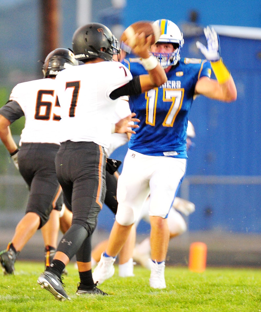 Prescott's Aaron Greene goes for a pass block as the Badgers take on Desert Edge Friday August 17, 2018 to open the 2018 football season. (Les Stukenberg/Courier)