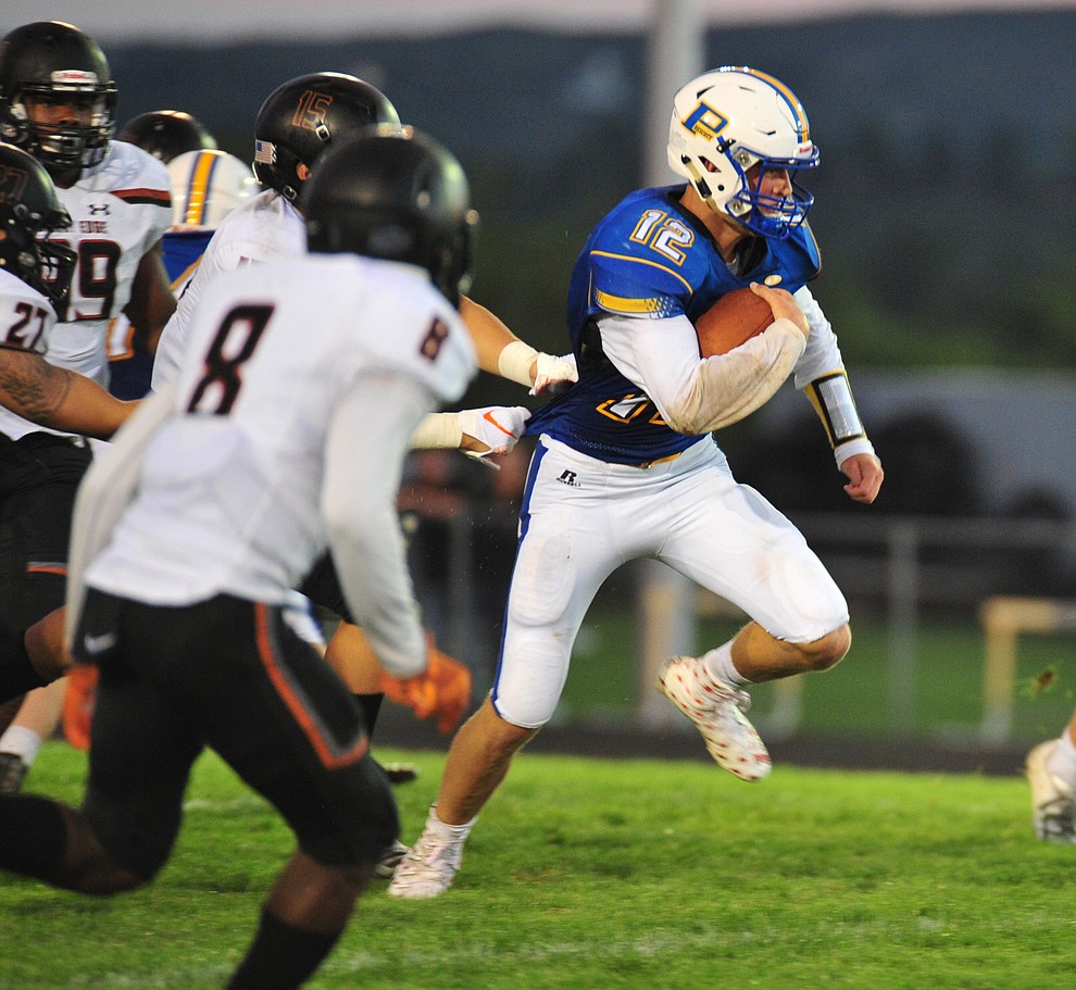 Prescott's Austin Clark breaks free as the Badgers take on Desert Edge Friday August 17, 2018 to open the 2018 football season. (Les Stukenberg/Courier)