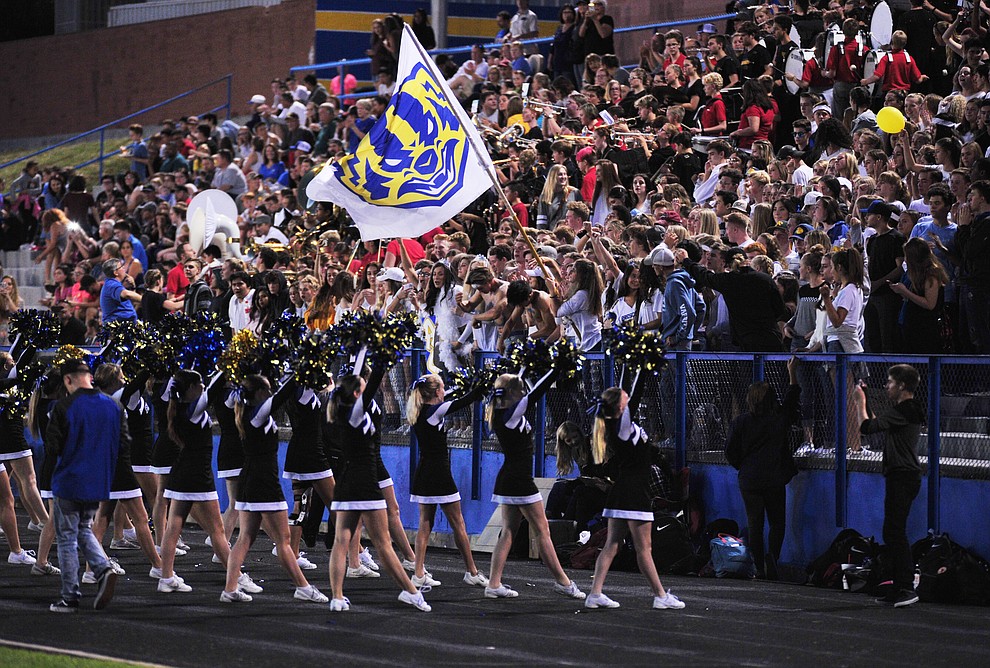 Prescott's fans celebrate a touchdown as the Badgers take on Desert Edge Friday August 17, 2018 to open the 2018 football season. (Les Stukenberg/Courier)