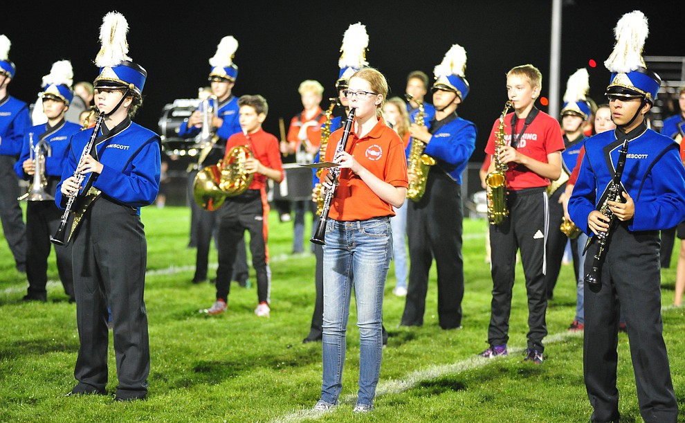 The Pride of Prescott Marching Band and the Prescott Mile High Middle School band combined to entertain the crowd during halftime as the Badgers take on Desert Edge Friday August 17, 2018 to open the 2018 football season. (Les Stukenberg/Courier)