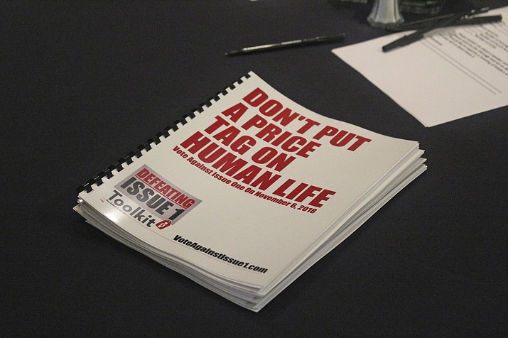 In this July 26, 2018 photo, an information booklet about a "tort reform" measure appearing on Arkansas' ballot sits on a table at a breakfast meeting of pastors in Little Rock, Arkansas. The Family Council Action Committee, a conservative Christian group, is rallying churches against the ballot measure to impose new limits on lawsuit damages. (Andrew Demillo/AP)

