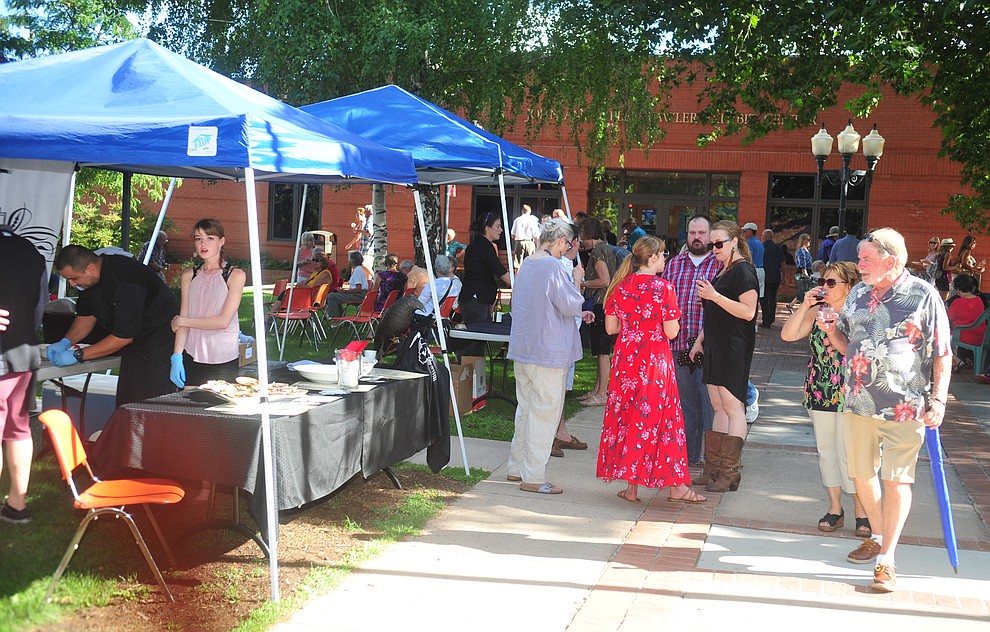 Patrons wander the grounds during the 6th annual Sharlot's WInefest at the Sharlot Hall Museum in Prescott Saturday, August 18, 2018. (Les Stukenberg/Courier)