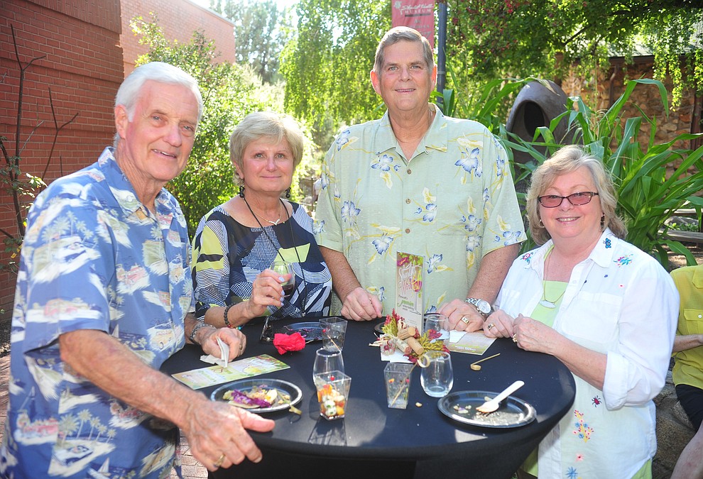 Bill Dennis, Diane Benjamin, Bob Benjamin and Rita Dennis enjoy the wine and hors d'oeuvres at the 6th annual Sharlot's WInefest at the Sharlot Hall Museum in Prescott Saturday, August 18, 2018. (Les Stukenberg/Courier)