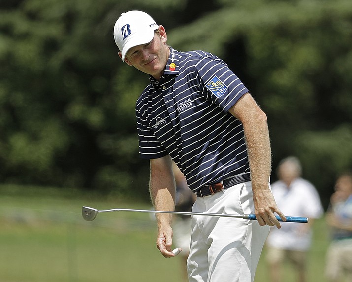 Brandt Snedeker reacts to his putt on the first hole during the final round of the Wyndham Championship golf tournament at Sedgefield Country Club in Greensboro, N.C., Sunday, Aug. 19, 2018. (Chuck Burton/AP Photo)