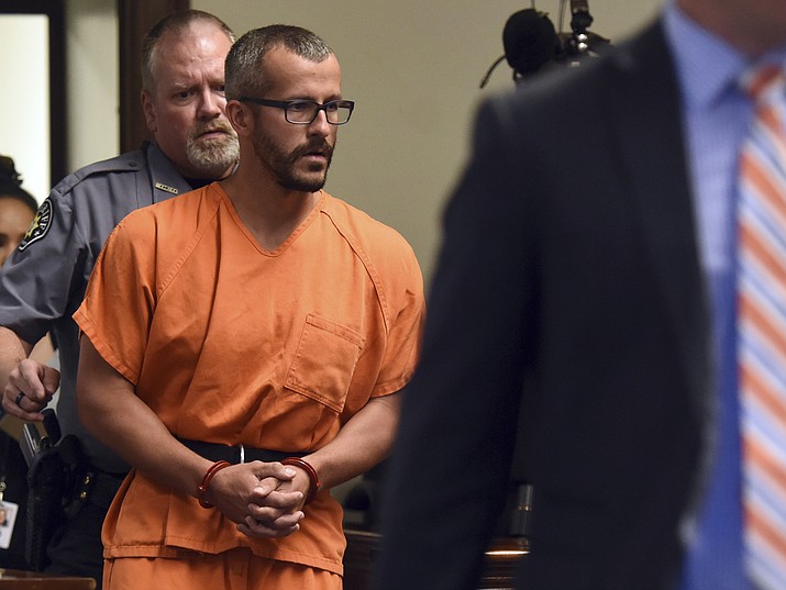  FILE - In this Aug. 16, 2018, file photo, Christopher Watts is escorted into the courtroom before his bond hearing at the Weld County Courthouse in Greeley, Colo. Charges were filed Monday, Aug. 20, 2018, against 33-year-old Watts in the deaths of his pregnant wife and their two young daughters. (Joshua Polson/The Greeley Tribune via AP, Pool, file), Pool, file)