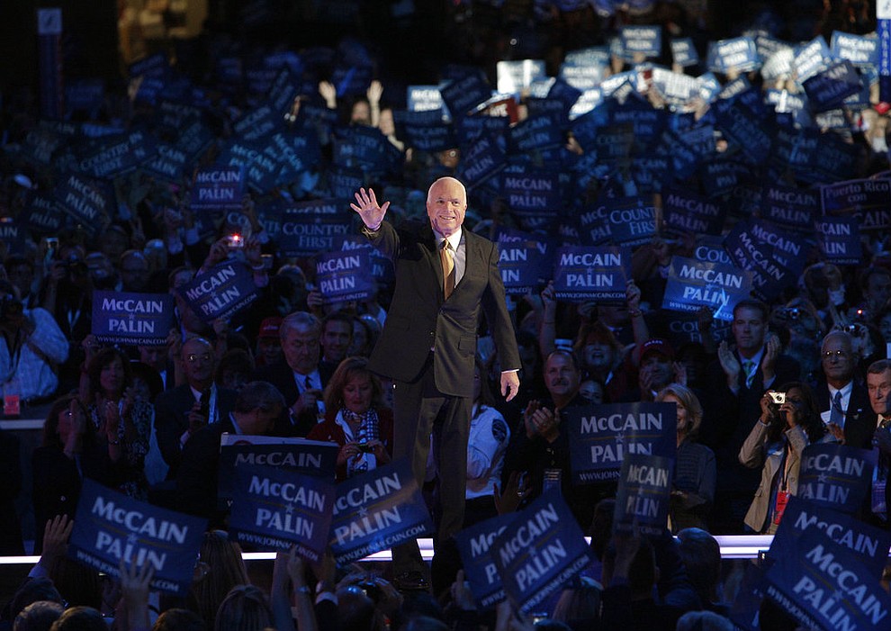 FILE - In this Sept. 4, 2008, file photo, Republican presidential candidate John McCain acknowledges the crowed as he goes on stage at the Republican National Convention in St. Paul, Minn. Aide says senator, war hero and GOP presidential candidate McCain died Saturday, Aug. 25, 2018. He was 81. (AP Photo/Paul Sancya, File)