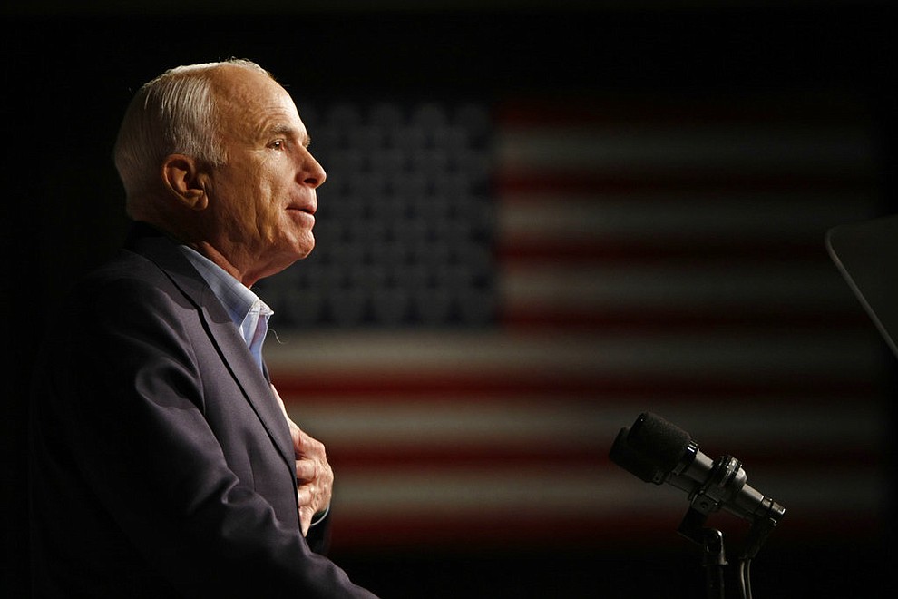 FILE - In this Oct. 11, 2008, file photo, Republican presidential candidate Sen. John McCain, R-Ariz., speaks at a rally in Davenport, Iowa. Arizona Sen. McCain, the war hero who became the GOP's standard-bearer in the 2008 election, has died. He was 81. His office says McCain died Saturday, Aug. 25, 2018. He had battled brain cancer. (AP Photo/Gerald Herbert, File)